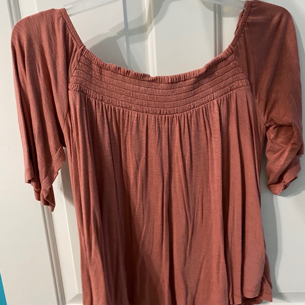 Pinky orange off the shoulder shirt